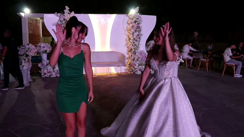 The bride dancing by the stage
